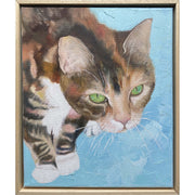 Realistic oil painting of a green eyed cat on a blue background.